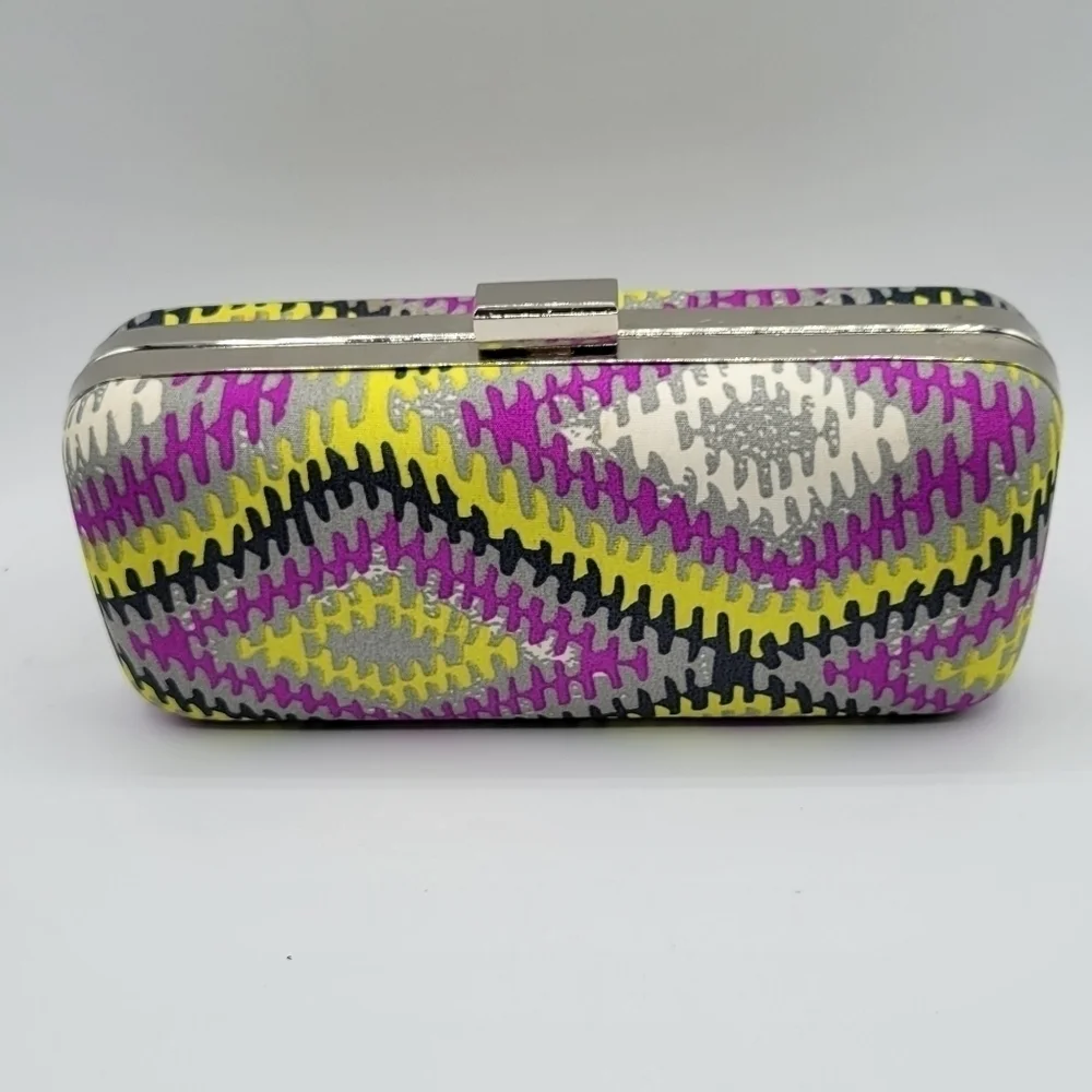 Charming Charlie yellow multicolor clutch Purse